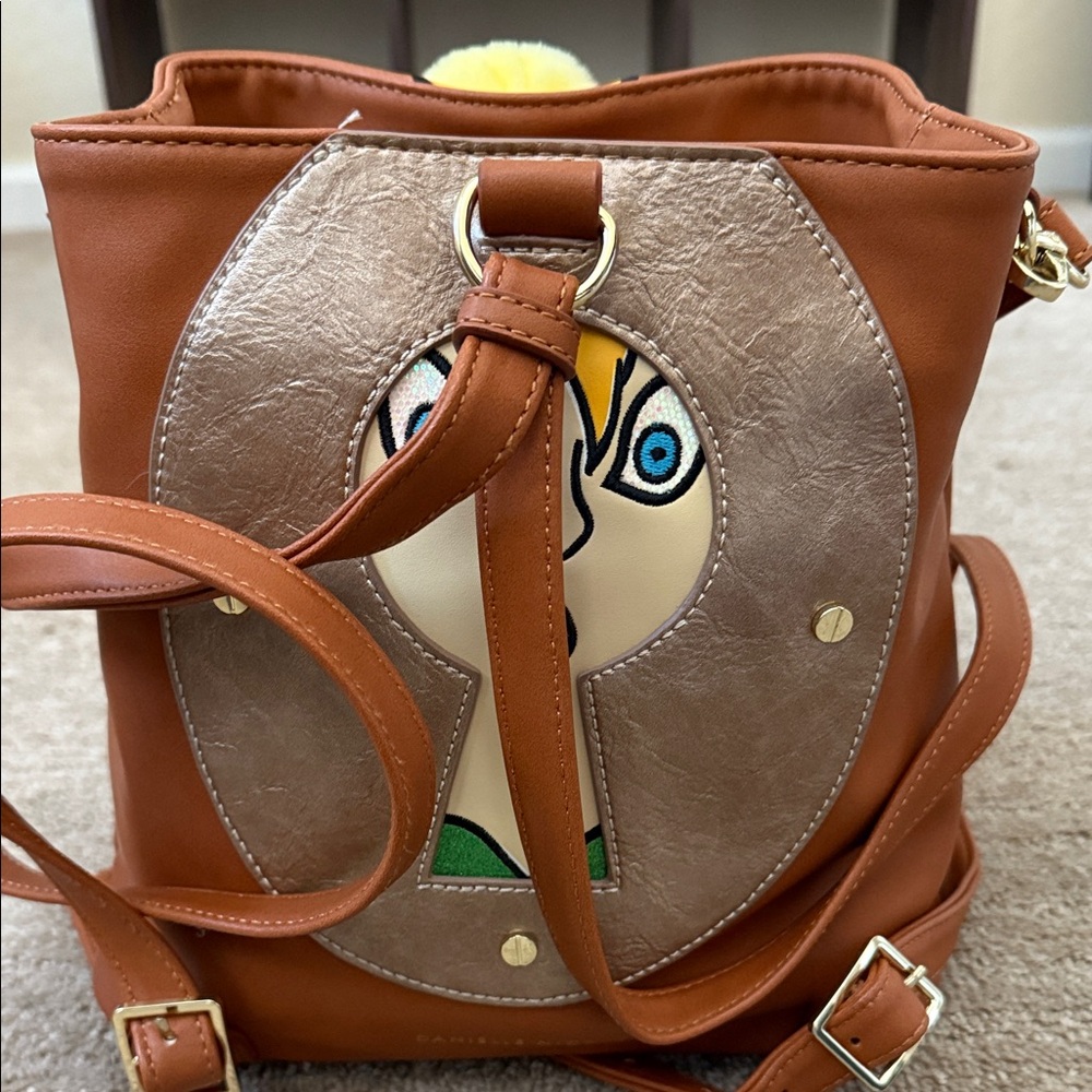 Brown Backpack with Silver Wings and Yellow Pom Pom - Picture 2 of 3